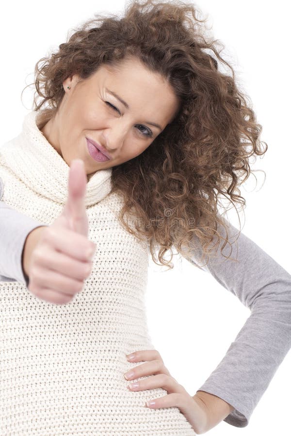 Woman blinking eye and making ok sign