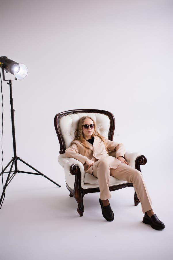Woman blonde blogger in white photo studio royalty free stock photos