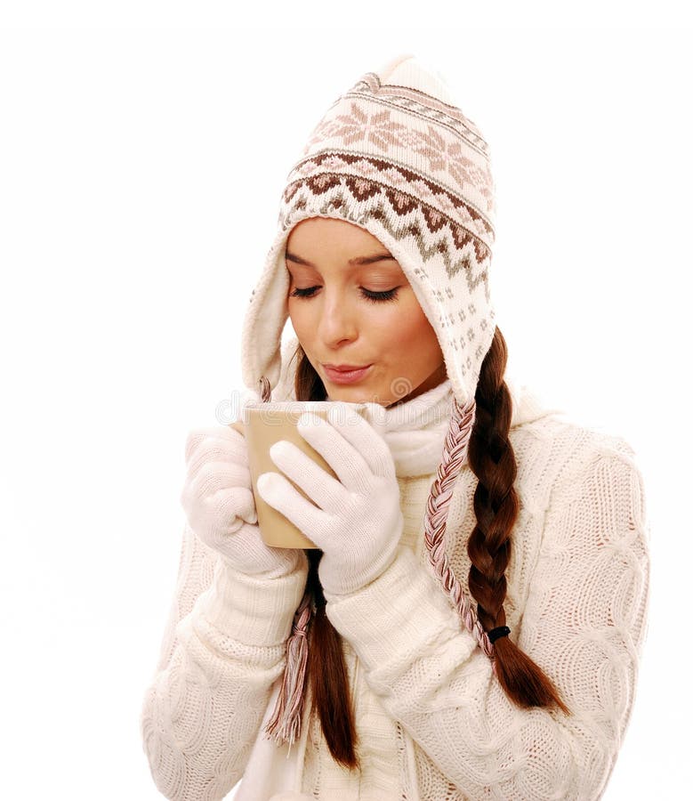 Woman blowing hot chocolate