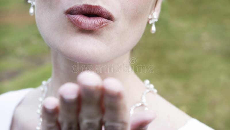 Woman blowing kiss