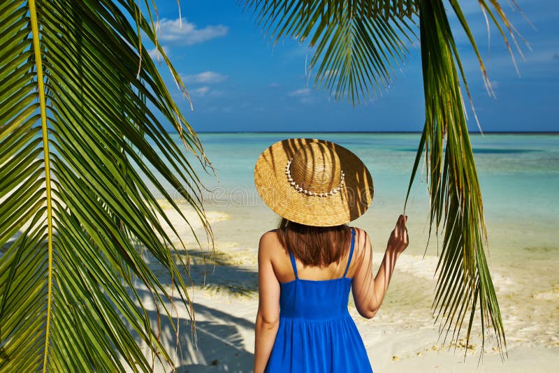 Woman in Blue Dress on a Beach at Maldives Stock Photo - Image of ...
