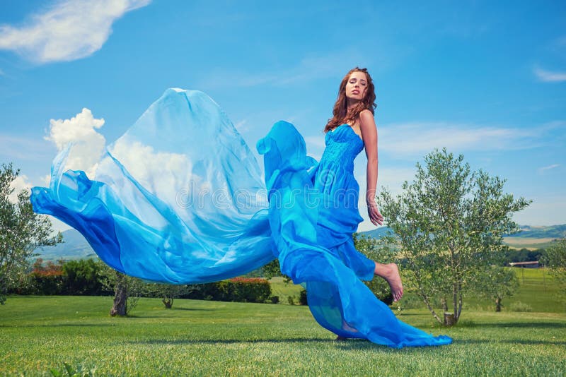 Woman in Blue Dress on Tuscany Hills Stock Image - Image of posing ...