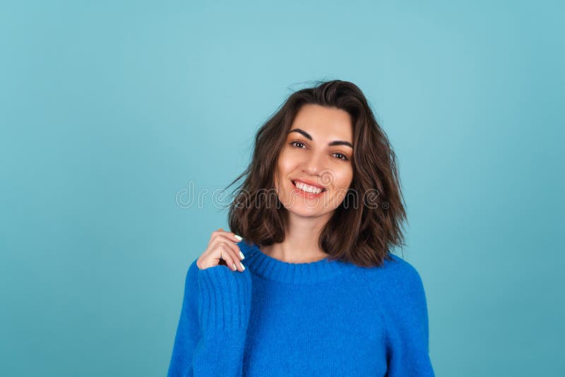 Woman in a Blue Knitted Sweater and Natural Make-up, Curly Short Hair ...