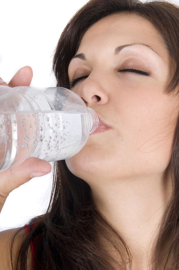 Woman with bottle of mineral water isolated