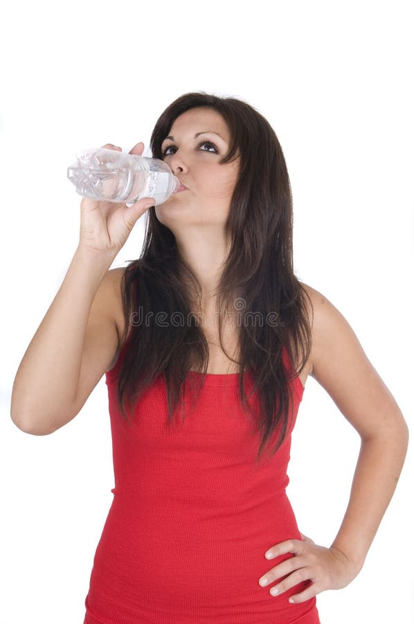 Woman with bottle of mineral water isolated