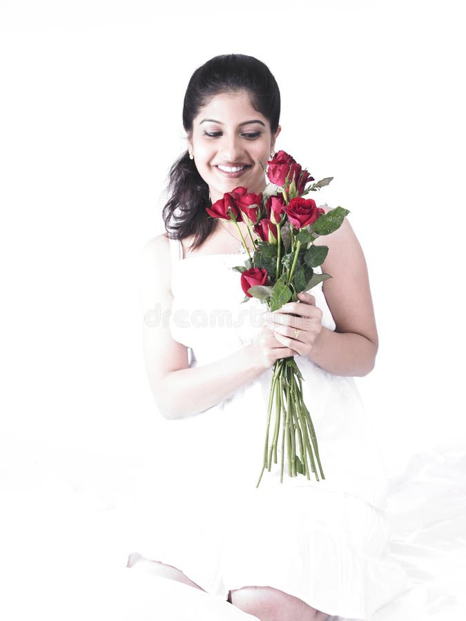 Woman with a bouquet of roses