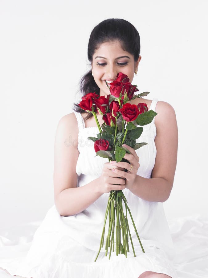 Woman with a bouquet of roses