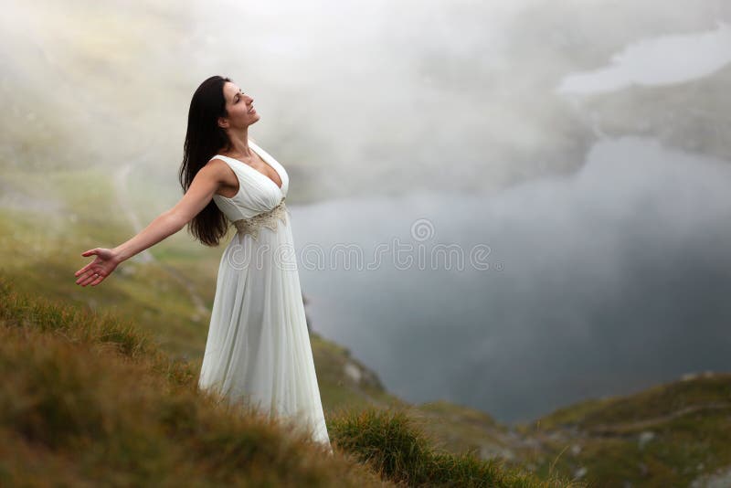 Woman breathing fresh mountain air stock photography Woman breathing fresh mountain air stock photography