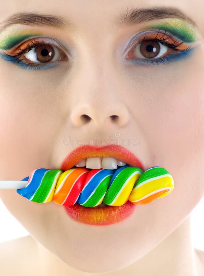 Woman with bright candy close-up