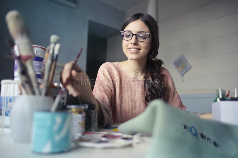Woman In Brown Long-sleeved Shirt Wearing Eyeglasses Holding Paint Brush Free Public Domain Cc0 Image