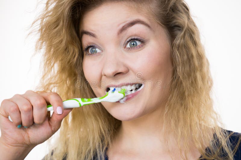 Woman brushing cleaning teeth royalty free stock image Woman brushing cleaning teeth royalty free stock image
