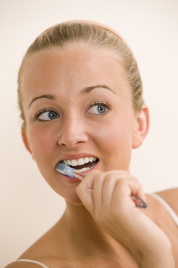 Woman Brushing Teeth