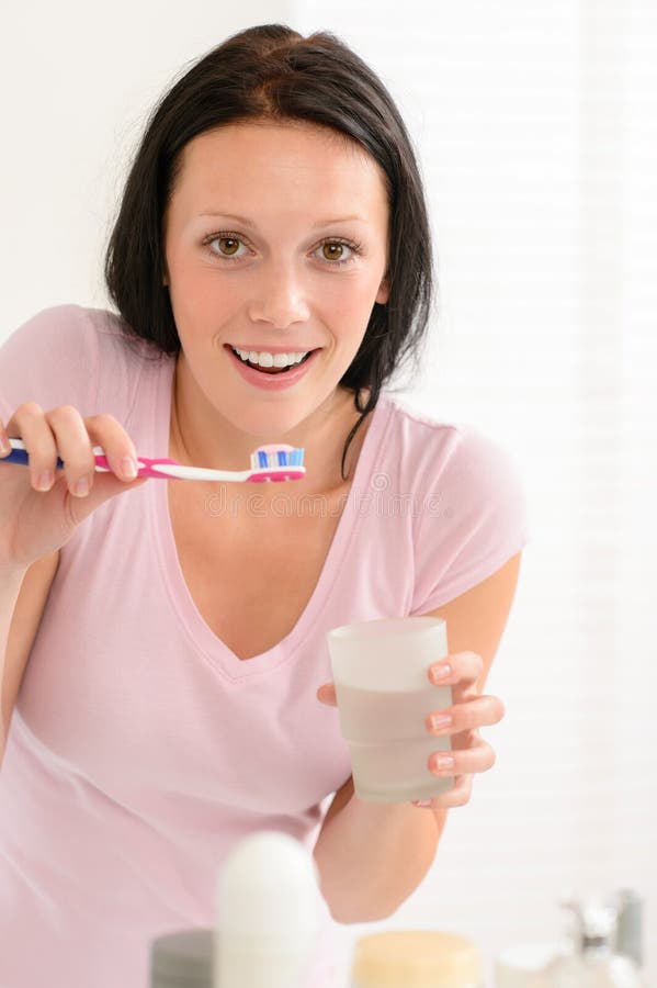 Woman Brushing Teeth Holding Glass of Water Stock Photo Image of
