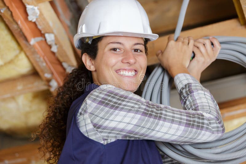 Woman builder looking at camera stock images Woman builder looking at camera stock images
