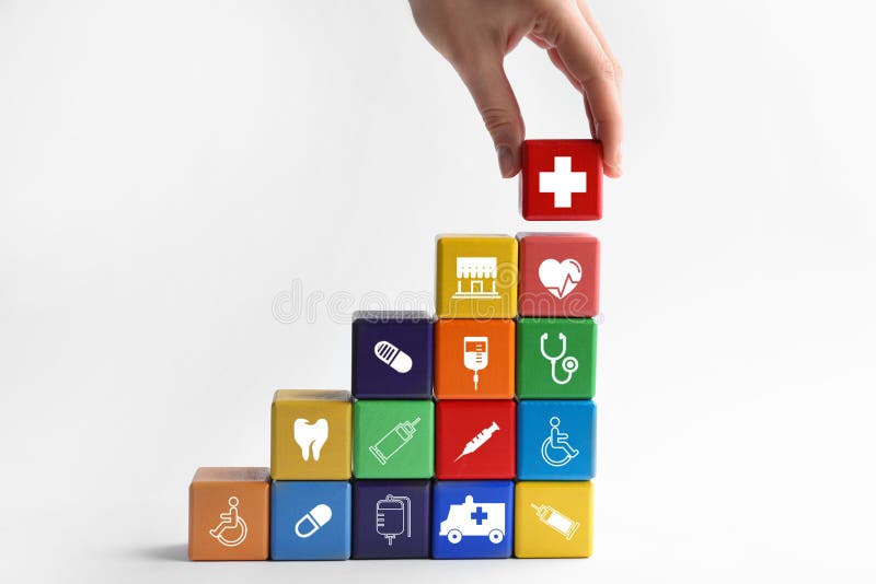 Woman building stairs with colorful cubes on background. Health insurance concept