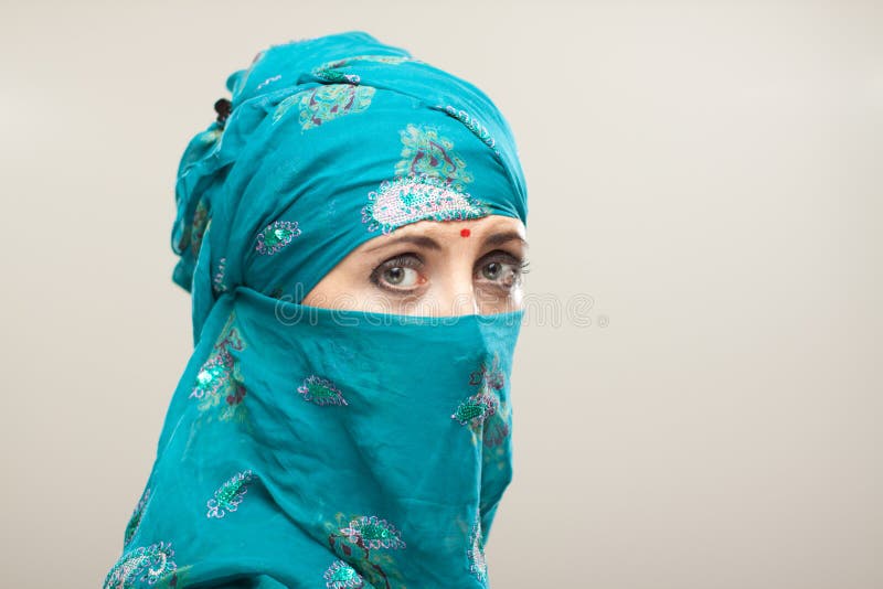 Woman in burqa with makeup