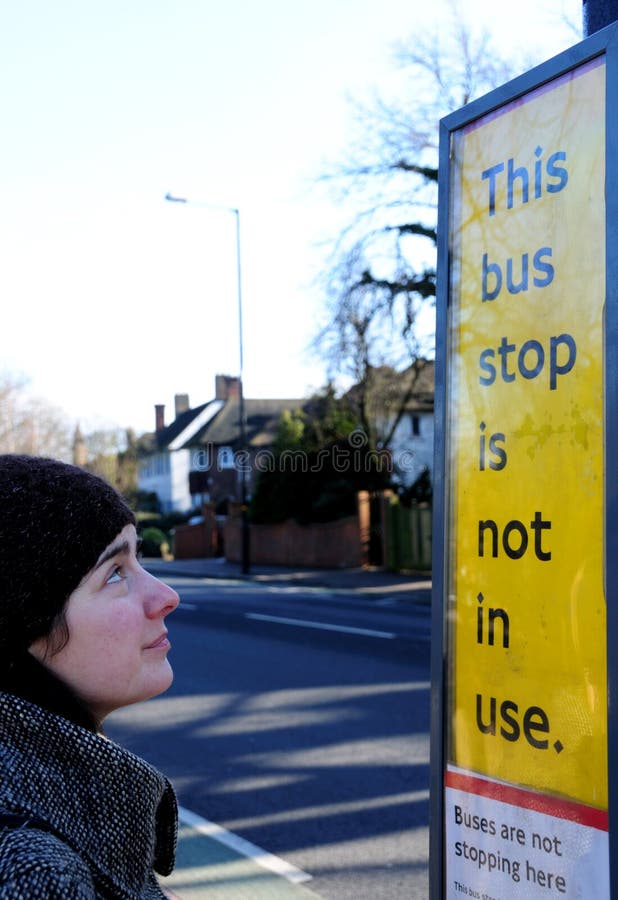 Woman at bus stop