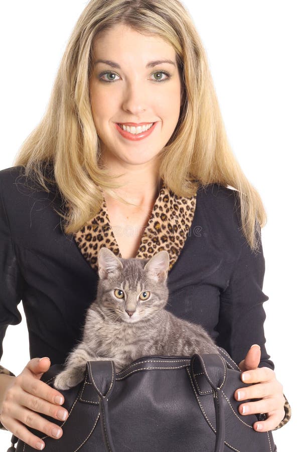 Woman in business suit kitten in bag