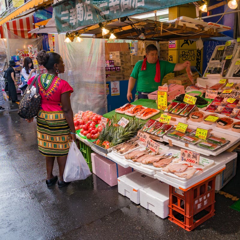 Japanese Street Food Vendor Preparing Food in Tokyo Editorial