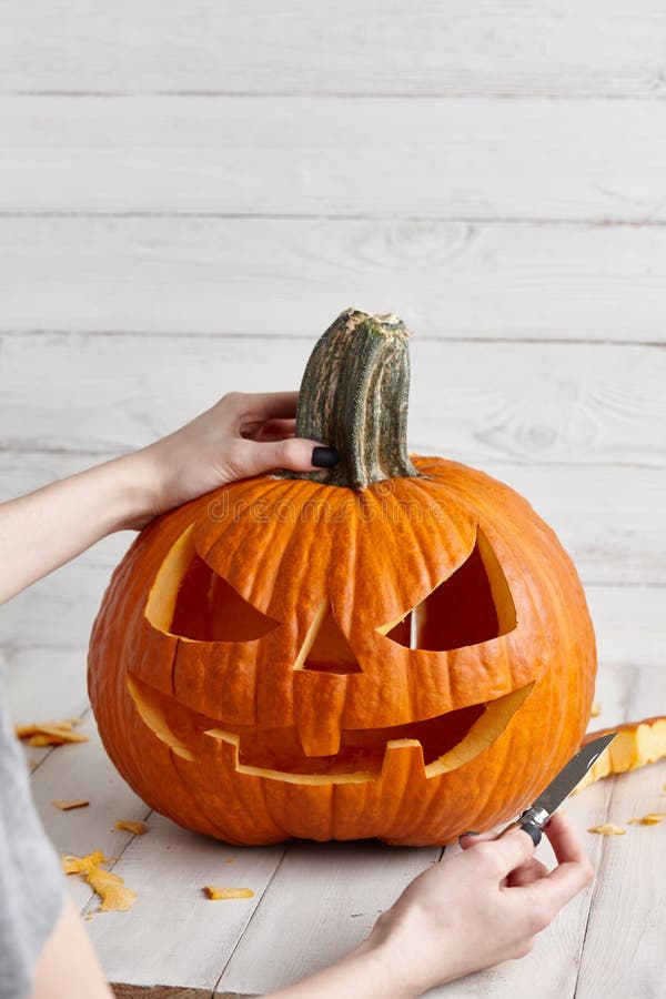 Carving Halloween Pumpkin into Jack-o-lantern, Close Up View Stock ...