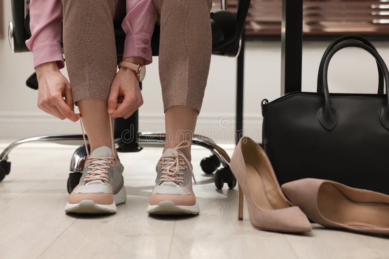 Woman Changing Shoes at Workplace in Office, Closeup Stock Image ...