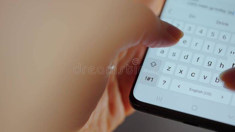 Woman chatting online on smartphone close up typing text message touching touchscreen keyboard using messenger application female stock video