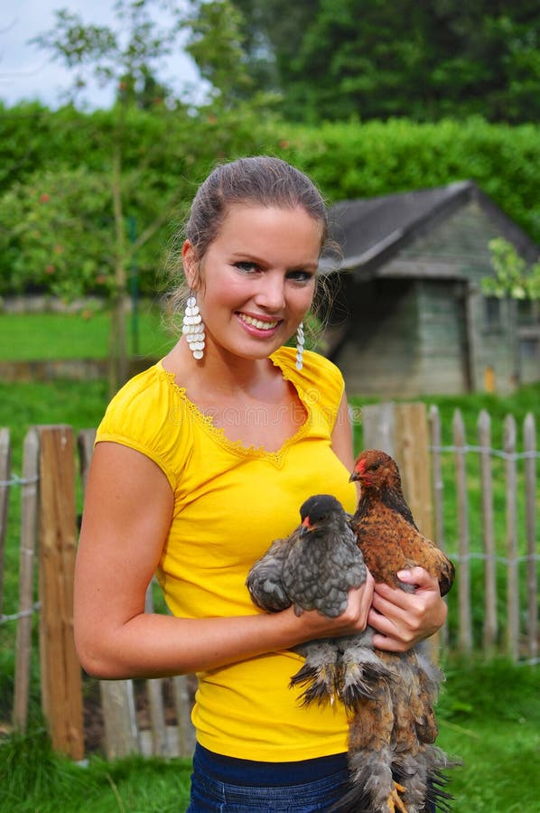 Woman with chickens stock photo Woman with chickens stock photo