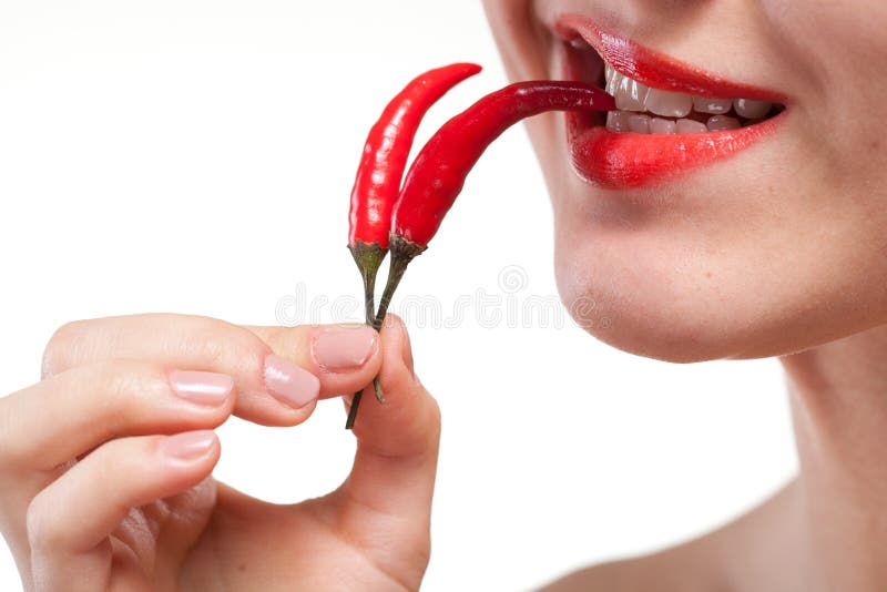 Woman with chili pepper isolated on white