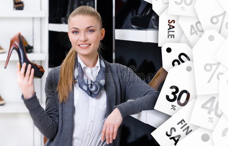 Woman chooses stylish pumps on sale stock photos Woman chooses stylish pumps on sale stock photos