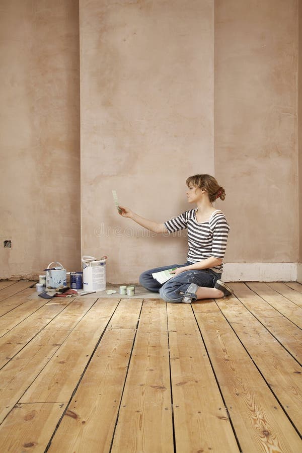 Woman Choosing Color From Swatches stock photos Woman Choosing Color From Swatches stock photos