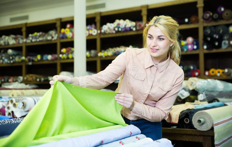 Woman Choosing Textiles in Shop Stock Image - Image of assortment ...