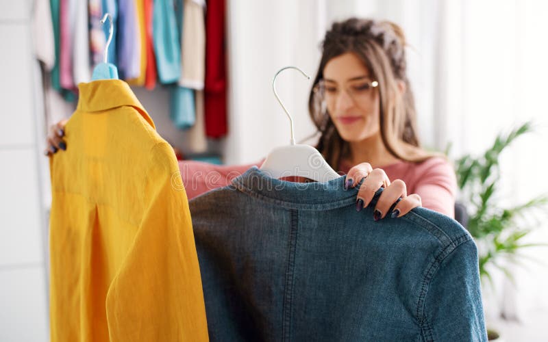 Woman Choosing What To Wear Stock Image - Image of people, clothing ...