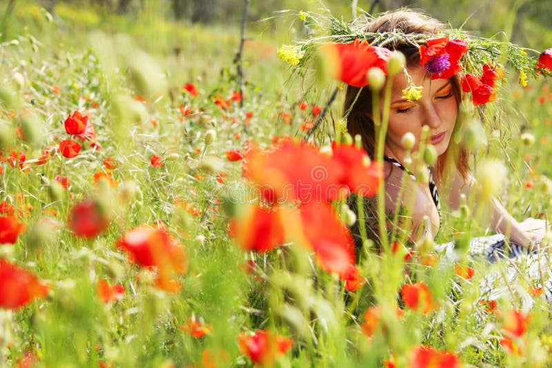 Woman and circlet of flowers