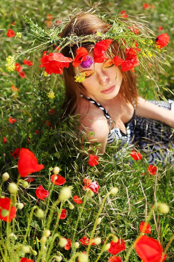 Woman and circlet of flowers