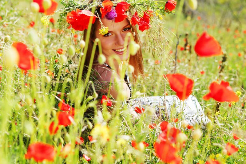 Woman and circlet of flowers