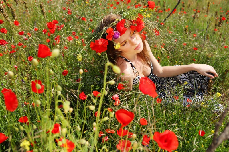 Woman and circlet of flowers