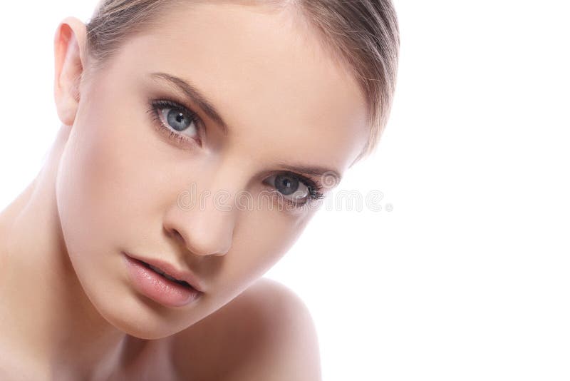 Woman with clean face over white background