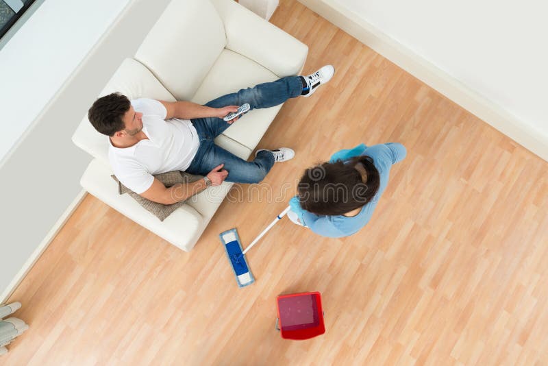 Woman cleaning floor stock photo Woman cleaning floor stock photo