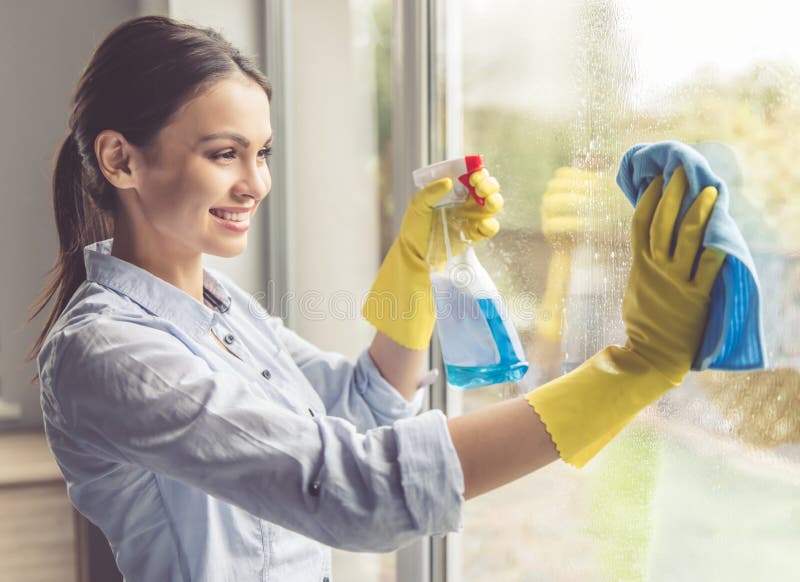 Woman cleaning her house stock photo. Image of caucasian 80187170