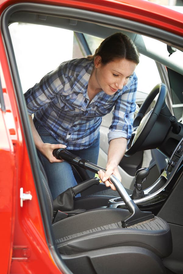 Woman Cleaning Inside of Car Using Vacuum Cleaner Stock Photo Image