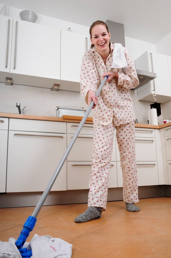 Woman cleaning the kitchen