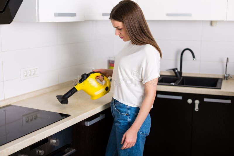 Woman Cleaning Kitchen with Steam Cleaner Stock Photo Image of