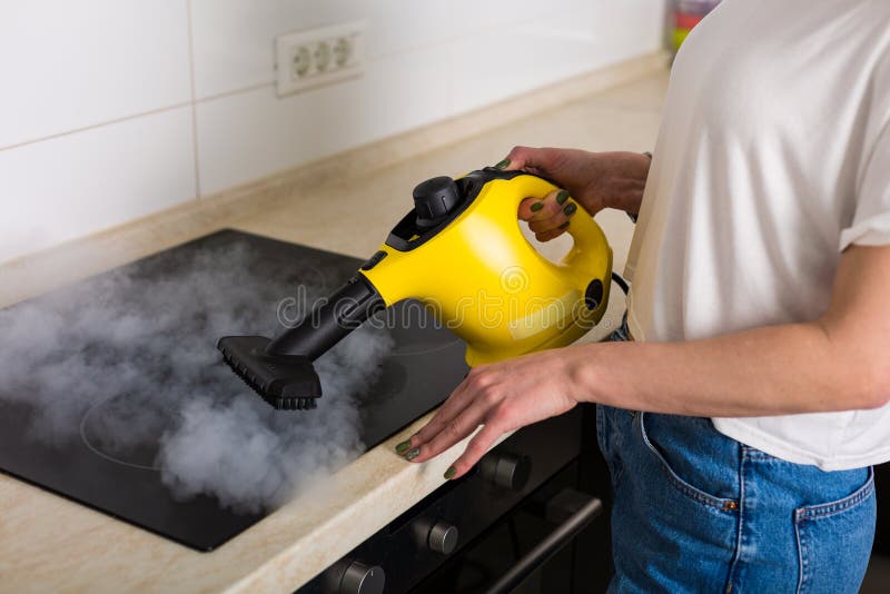 Woman Cleaning Kitchen with Steam Cleaner Stock Photo Image of