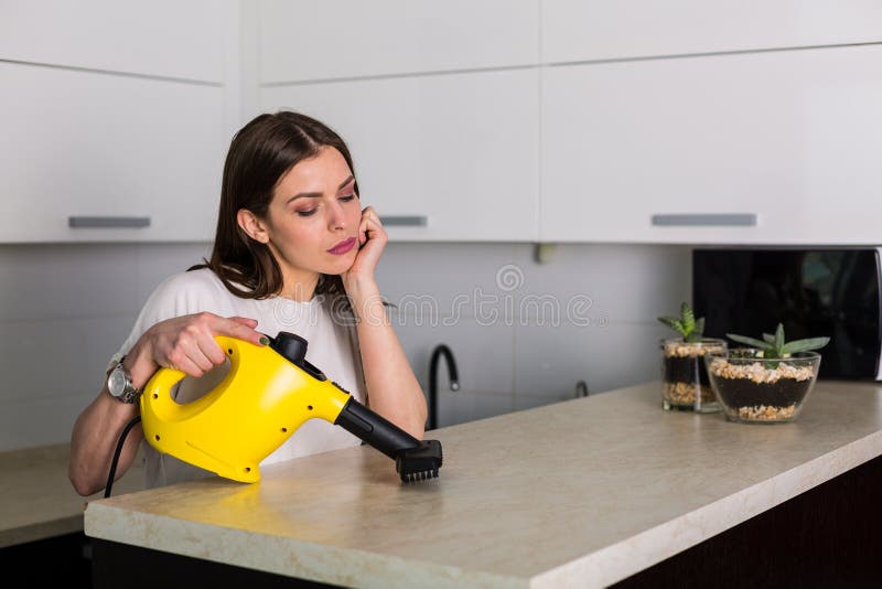 Woman Cleaning Kitchen with Steam Cleaner Stock Photo Image of brown