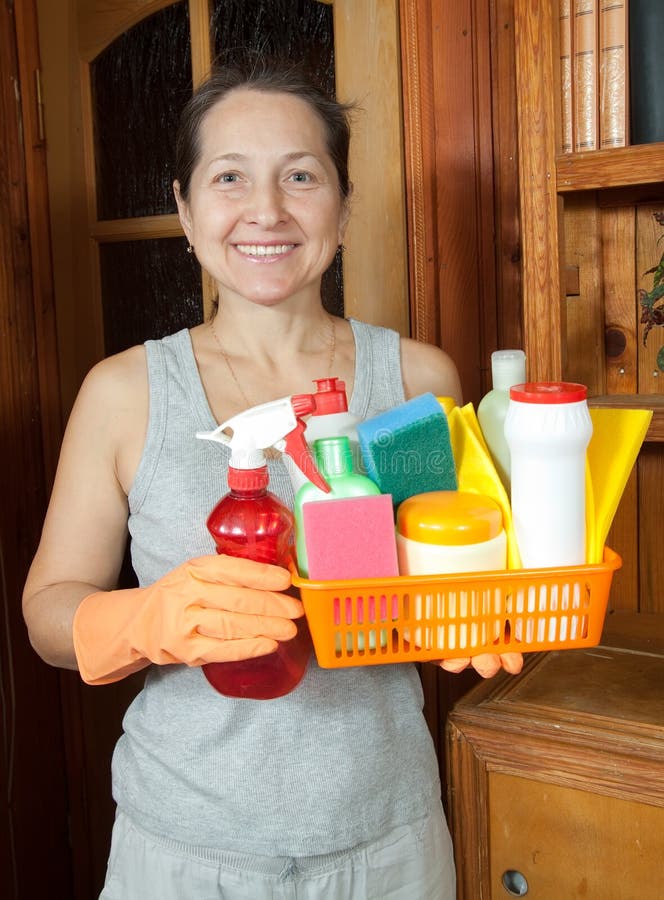 Woman with Cleaning Supplies Stock Photo Image of mature, interior
