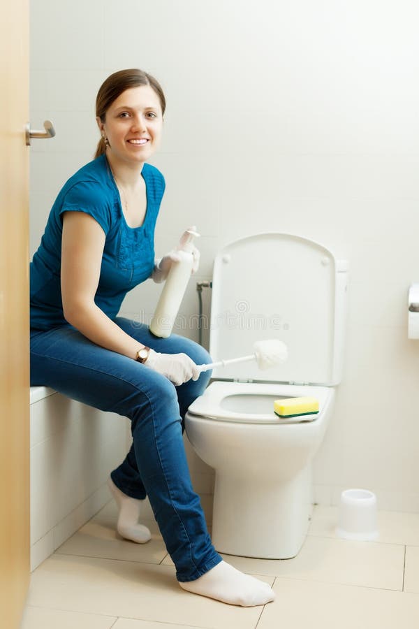Woman Cleaning Toilet Royalty Free Stock Photos - Image 