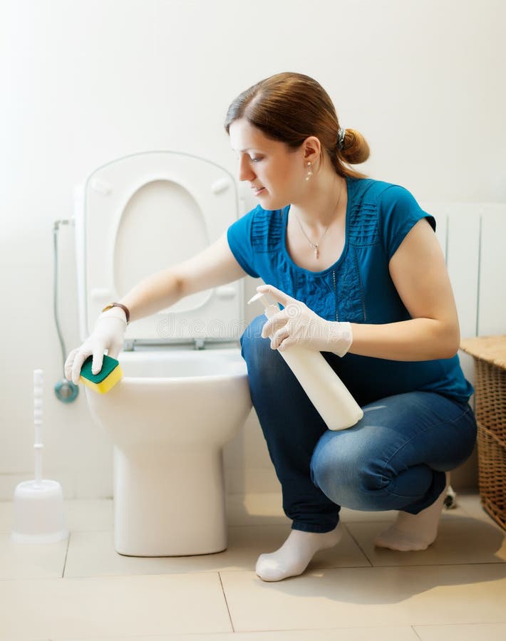 Smiling Housewife Cleaning Toilet Bowl With Sponge Stock 