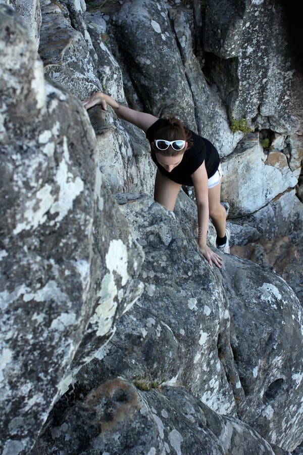Woman Climbing Up a Mountain Stock Photo Image of color,