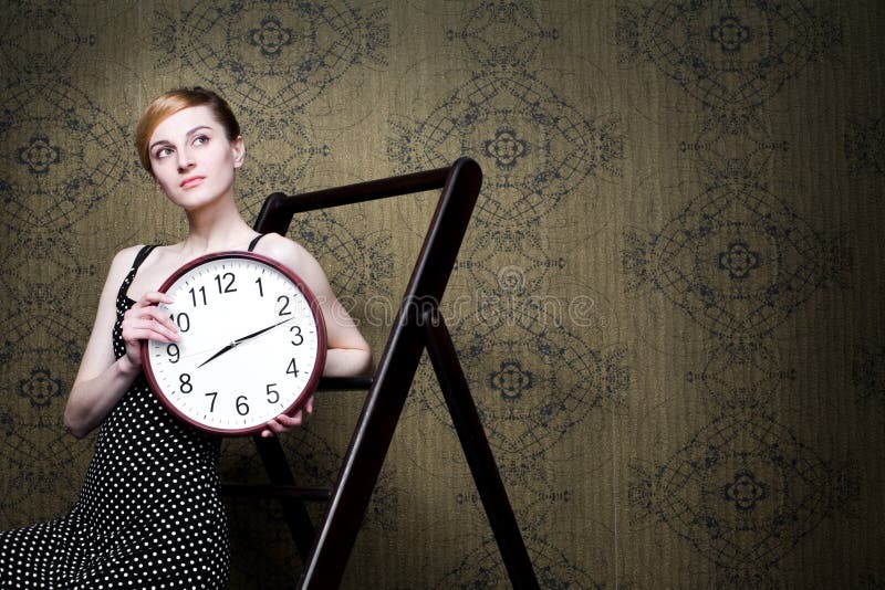 Woman with clock stock photo. Image of adult, female 17873506
