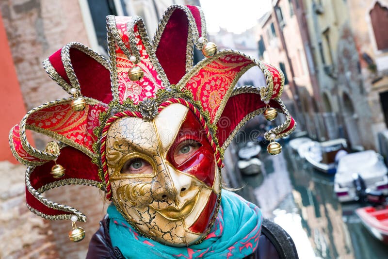 Woman in colorful joker mask at The Carnival of Venice 2018